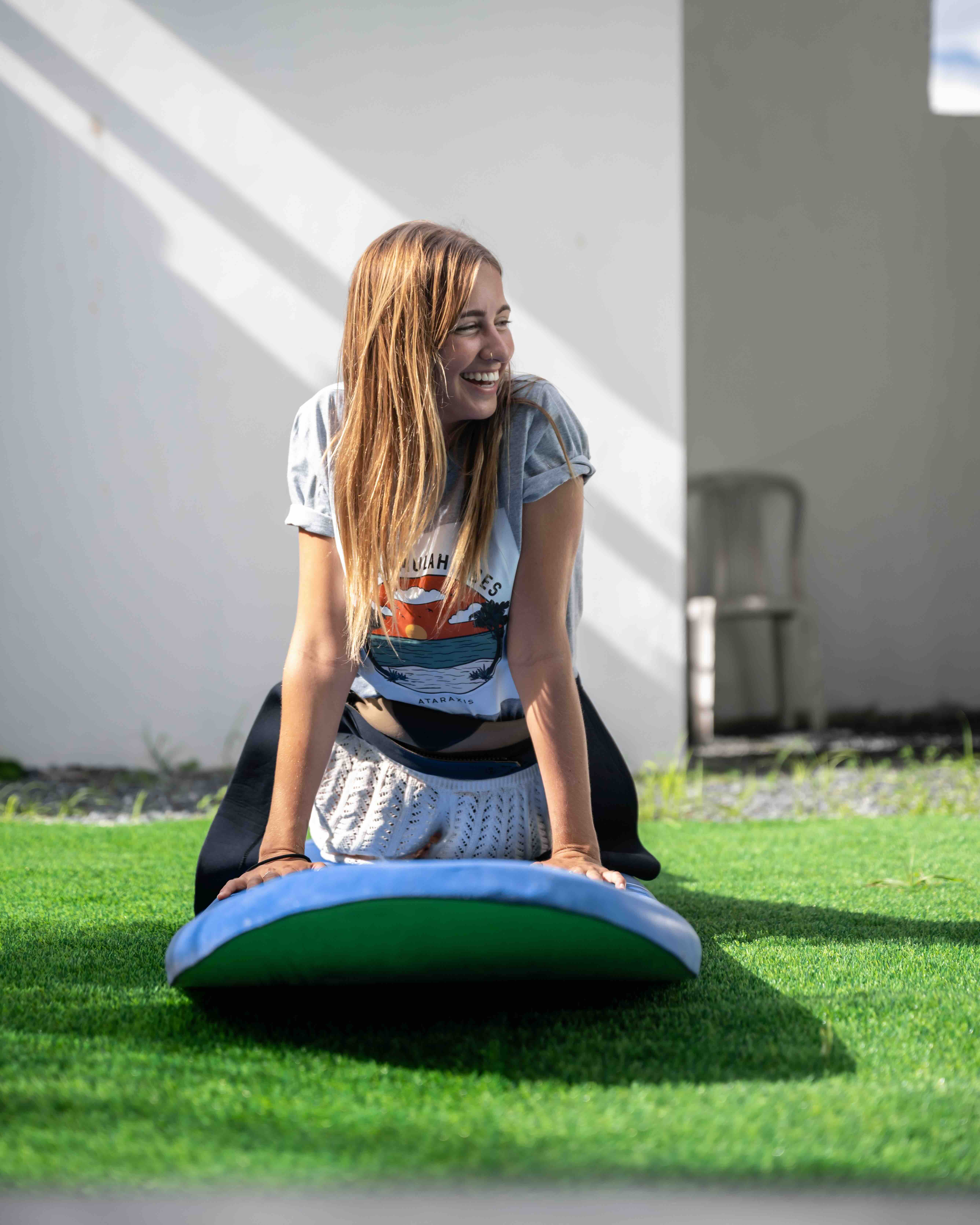 Jake learning how to pop up on a surfboard