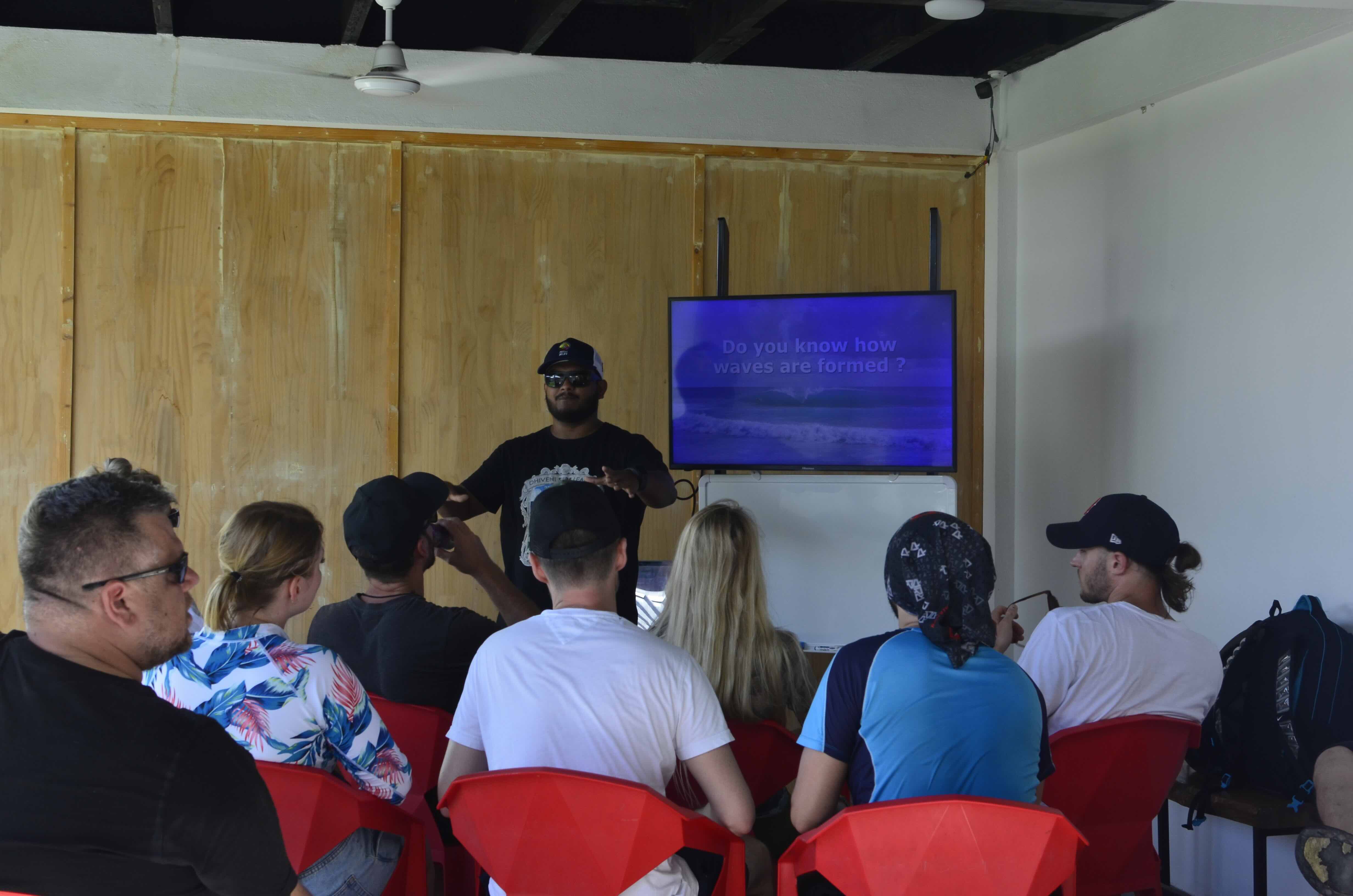 Shirrey taking lessons to a group of students